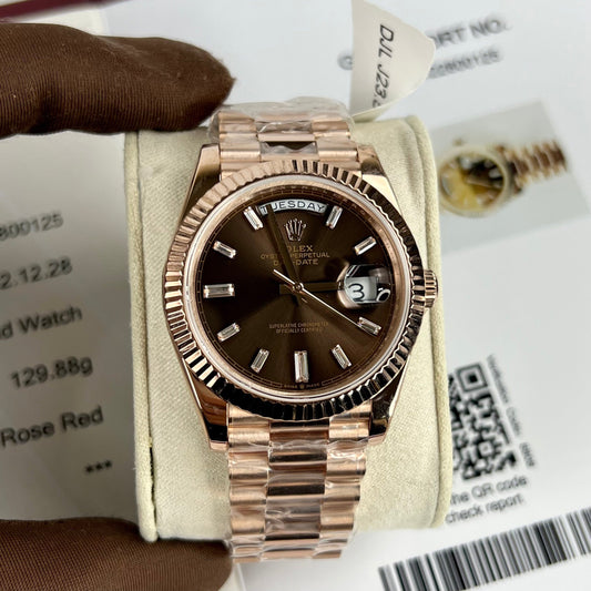 Rolex Day-Date 40 mm 228235 cadran chocolat or rose 18 carats rempli 150 grammes