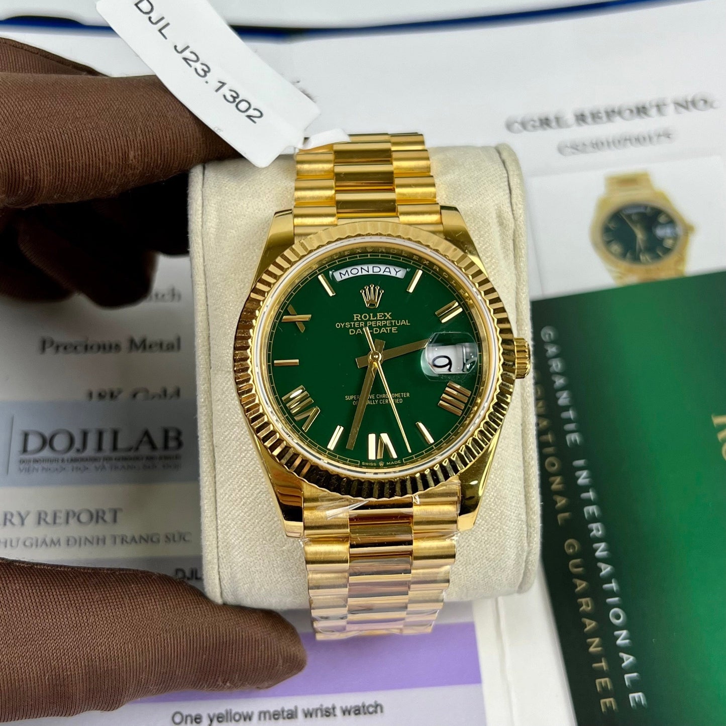 Rolex DayDate 40 mm 228238 enduit or jaune 18 carats cadran vert président 130 grammes