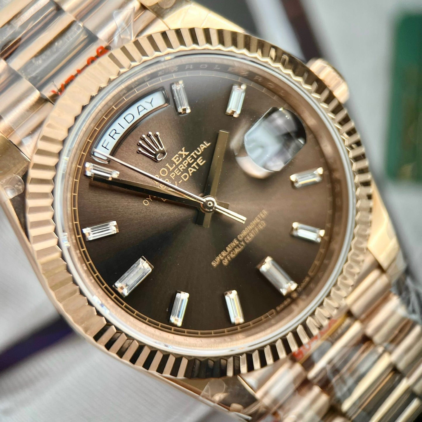 Rolex Day-Date 40 mm 228235 cadran chocolat or rose 18 carats rempli 167 grammes